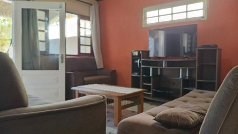 "ambiente de tv com 3 sofas" 