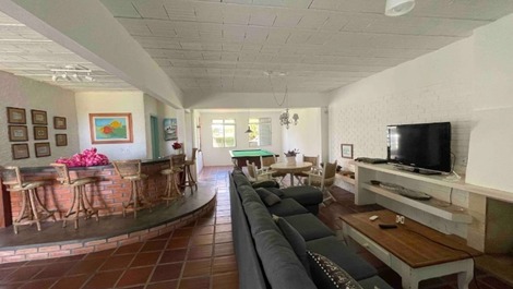 Casa 4 dormitórios com acesso pé na areia e vista panorâmica do mar