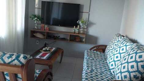 Linda casa na Praia Grande suíte com AC, poço, ótima região