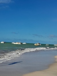 Suites a 100 metros da praia 🌴