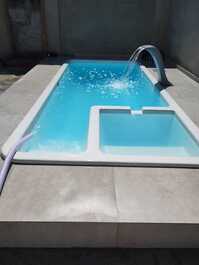 Casa com piscina ampla e confortável pra suas férias ou a trabalho