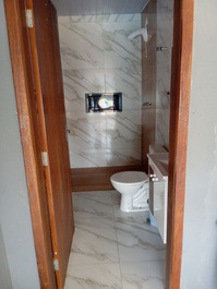 Banheiro na área de lazer  