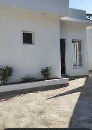 Casa ao toque do mar.