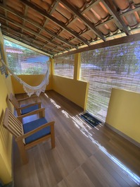 Varanda com rede de descanso 