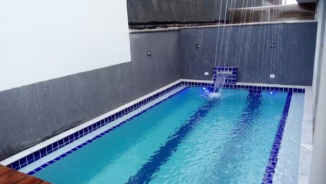 Jacuzzi aquecida, piscina, cineminha, wi-fi, churrasqueira (Itanhaém)