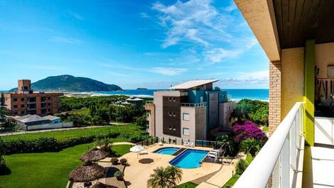 Apartment straight out of a soap opera, resort-style, right on the sand, swimming pools.