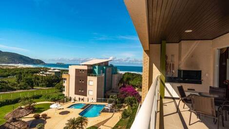 Apartment straight out of a soap opera, resort-style, right on the sand, swimming pools.