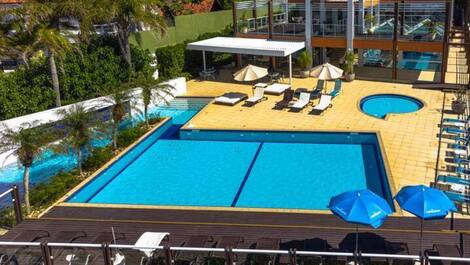 Apartment straight out of a soap opera, resort-style, right on the sand, swimming pools.