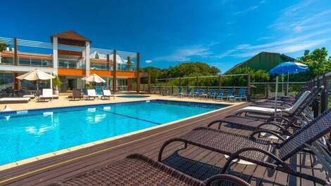 Apartment straight out of a soap opera, resort-style, right on the sand, swimming pools.
