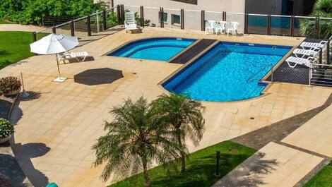 Apartment straight out of a soap opera, resort-style, right on the sand, swimming pools.