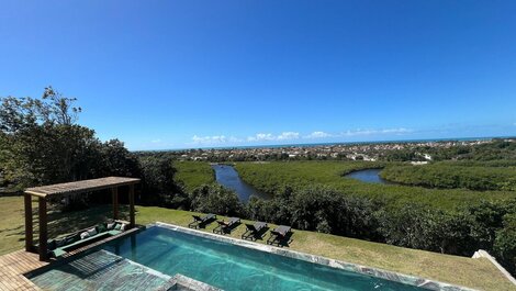 Luxo Caraíva: 7 suítes, piscina e vista rio‐mar