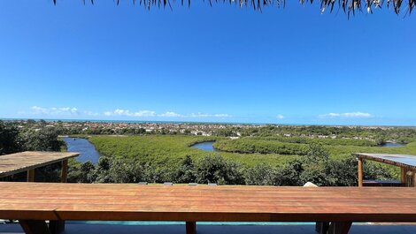 Luxo Caraíva: 7 suítes, piscina e vista rio‐mar
