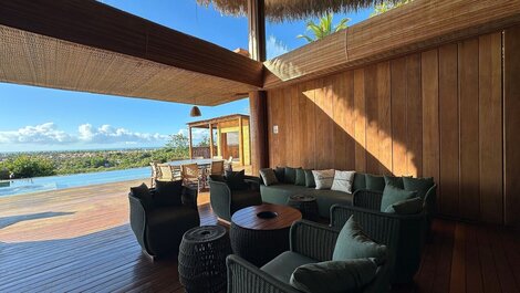 Luxo Caraíva: 7 suítes, piscina e vista rio‐mar