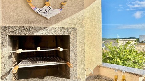 Sacada com churrasquiera