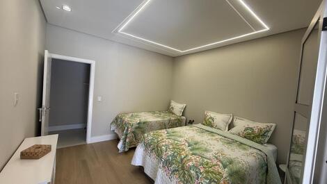 Suíte verde, cama queen e bicama