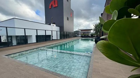 Apartamento para 4 personas con piscina y vistas al mar.