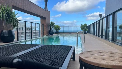 Apartamento para 4 personas con piscina y vistas al mar.