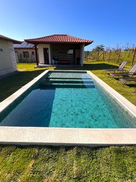 A shell integrated into Búzios, a pearl of a beach retreat.