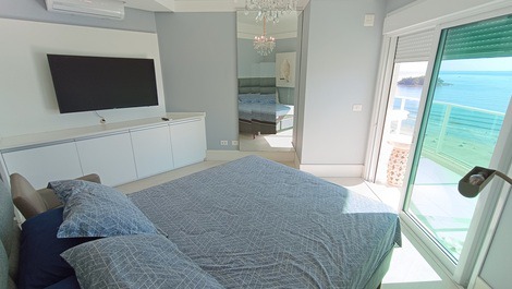 Oceanfront property with jacuzzi and charcoal grill, including 2 private parking spaces.