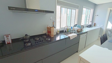 Oceanfront property with jacuzzi and charcoal grill, including 2 private parking spaces.