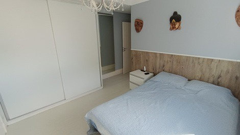 Oceanfront property with jacuzzi and charcoal grill, including 2 private parking spaces.