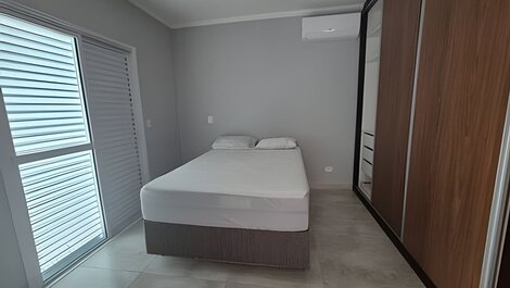 Spacious duplex with ocean view and hot tub.