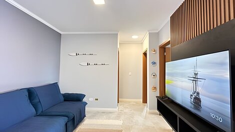 Spacious duplex with ocean view and hot tub.