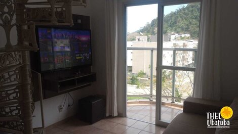 Penthouse in Praia Grande with air conditioning and barbecue for 13 people.