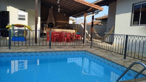 House in a gated community, with private pool and barbecue area.