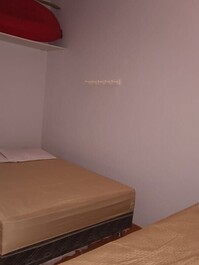 Yellow house with balcony for 12 people, 150 meters from the beach.