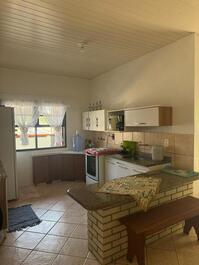 Cozinha integrada com a sala de estar