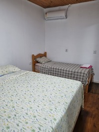 Nestled between the green of nature and the blue of the sea, lies my home. Come and see it.