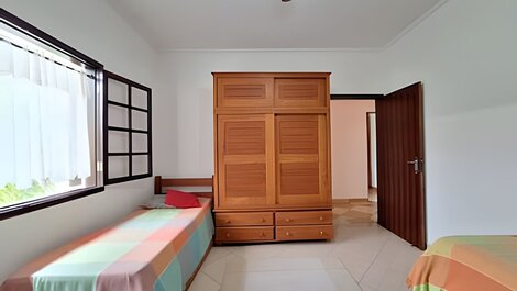 House with pool and barbecue area in a gated community.