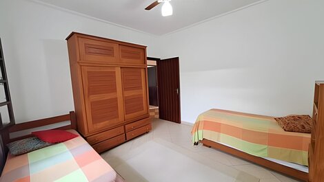 House with pool and barbecue area in a gated community.