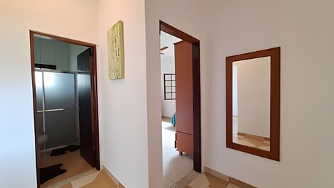 House with pool and barbecue area in a gated community.