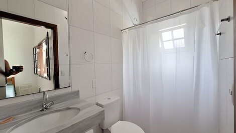 House with pool and barbecue area in a gated community.