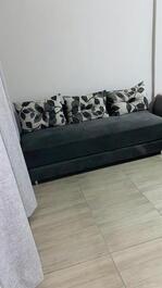 Studio apartment, cozy, bedroom, kitchen, bathroom.