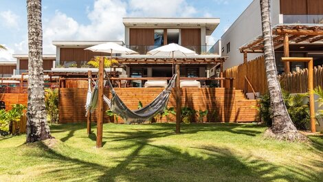 Feet in the sand in Milagres | Pool &amp; Sauna | Huna04