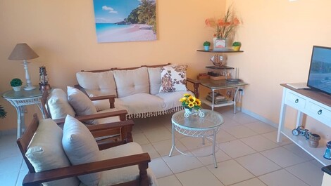 Sala de estar com smart tv (netflix-globoplay)