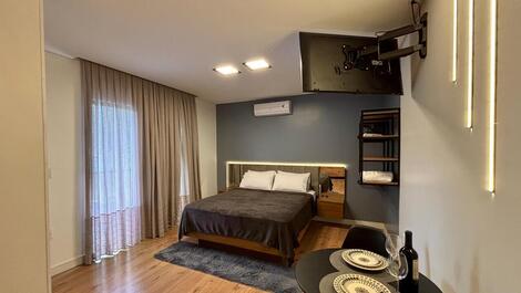 Quarto suite 02 com cozinha e ar condicionado