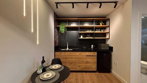 Quarto suite 02 com cozinha e ar condicionado