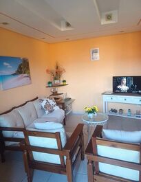 Sala de estar com smart tv (netflix-globoplay)