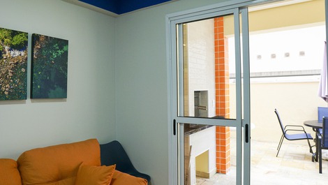 Sala com acesso para o quintal