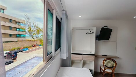 Cómoda suite con vistas al océano en la playa de Bessa.