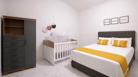Quarto convencional com berço 