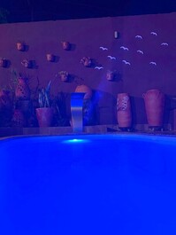 Casa en Caldas Novas, piscina climatizada, habitaciones con aire acondicionado, garaje.