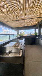 Área da churrasqueira no espaço gourmet  rooftop 