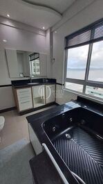 3 suites, 1 powder room, 2 parking spaces