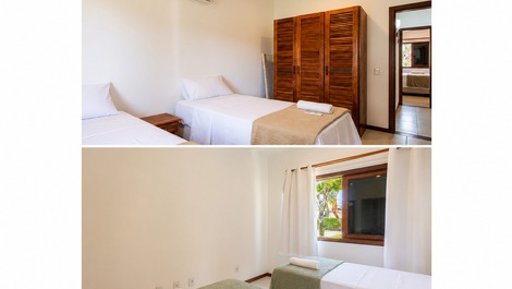 Quarto com duas camas de solteiro 