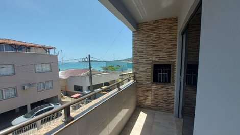 Sacada com churarsqueira vista mar
